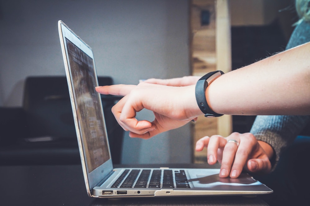 A shared laptop and notebooks